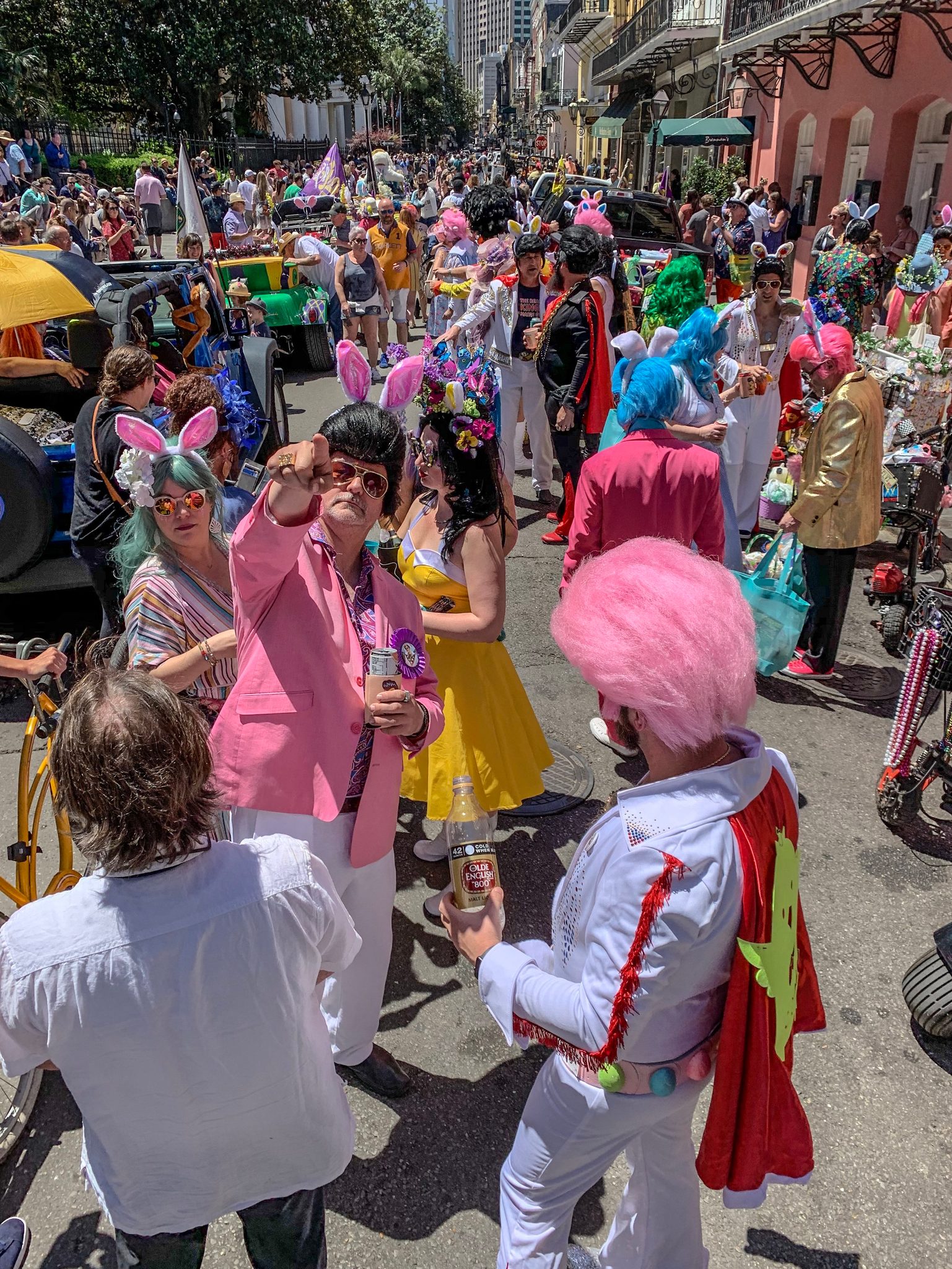 The Easter parade fills the street from wall to wall, bunny ears and pink wigs everywhere.