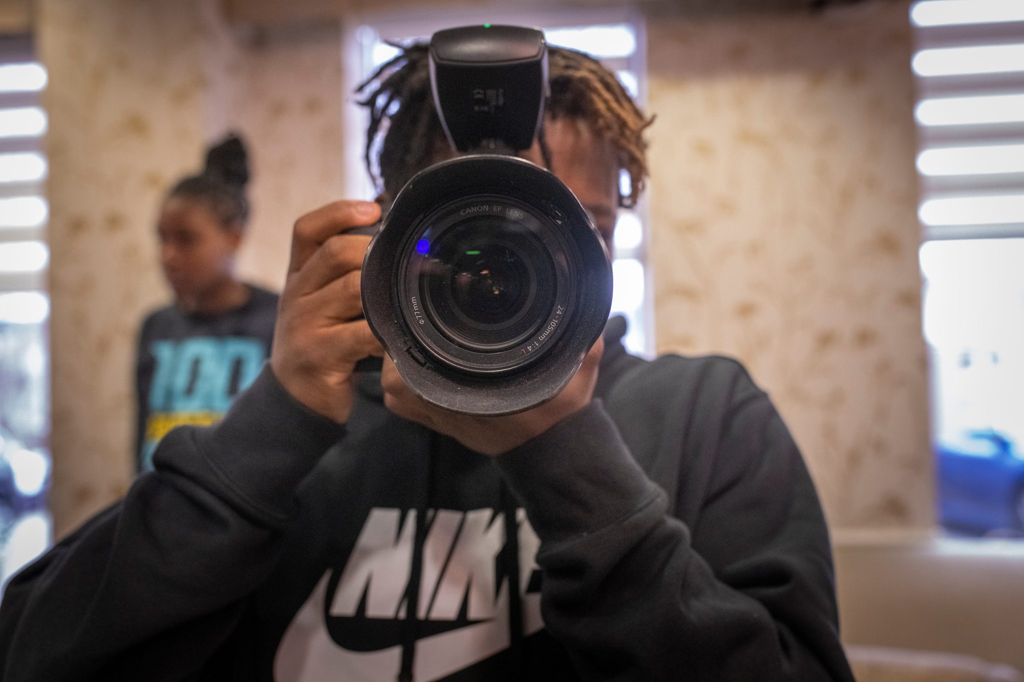 A young photographer turns the lens back on us.