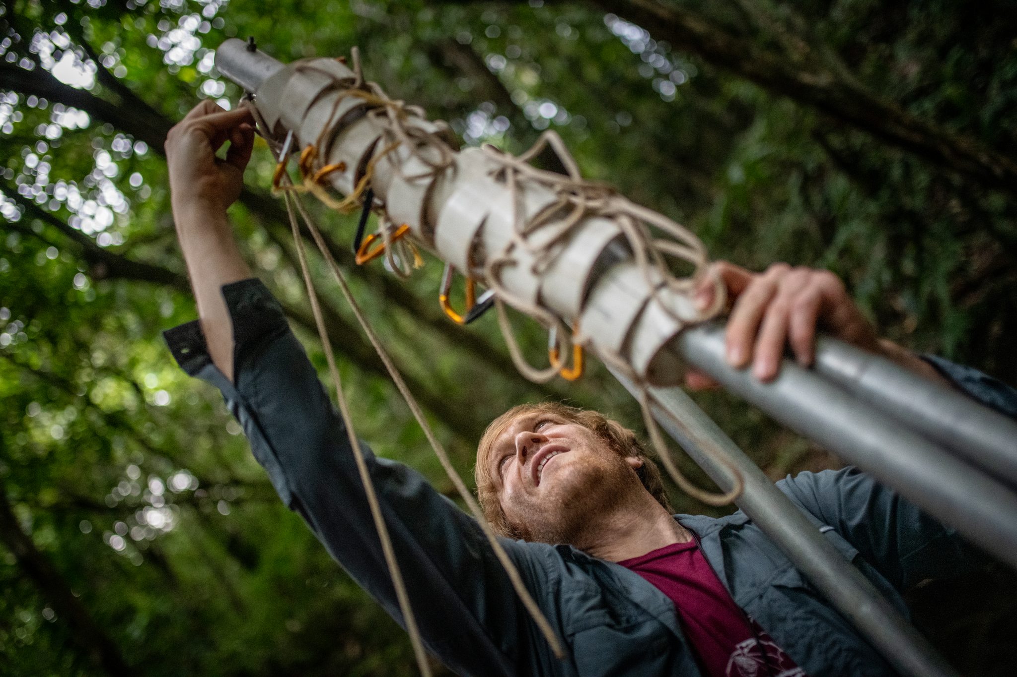 Rigging a net pole as the light fades.