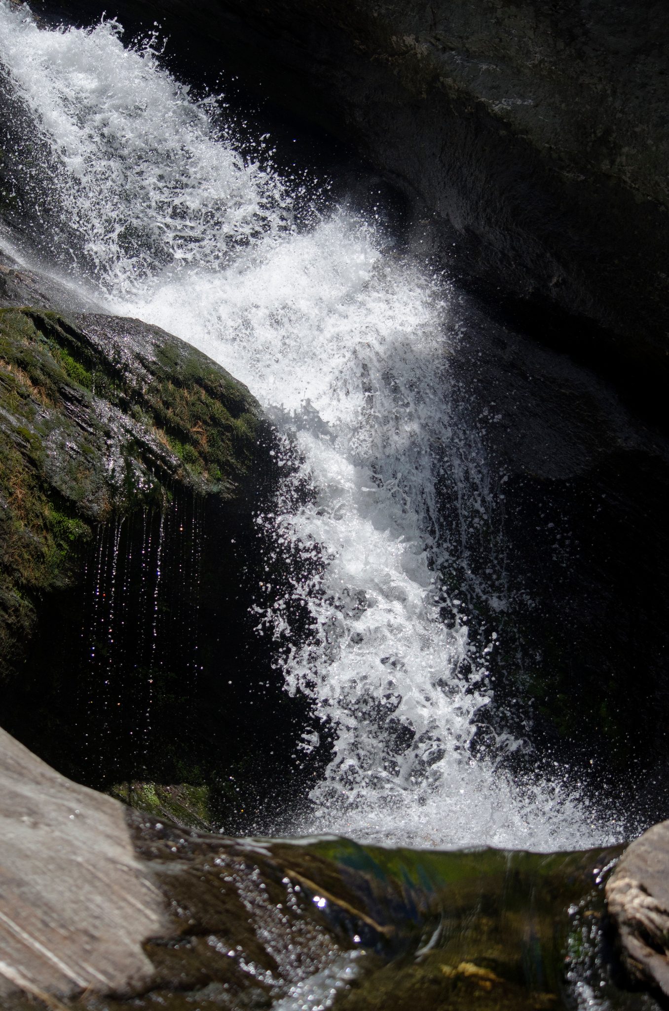 Hamilton Falls pours over the dark rock into a white cascade.