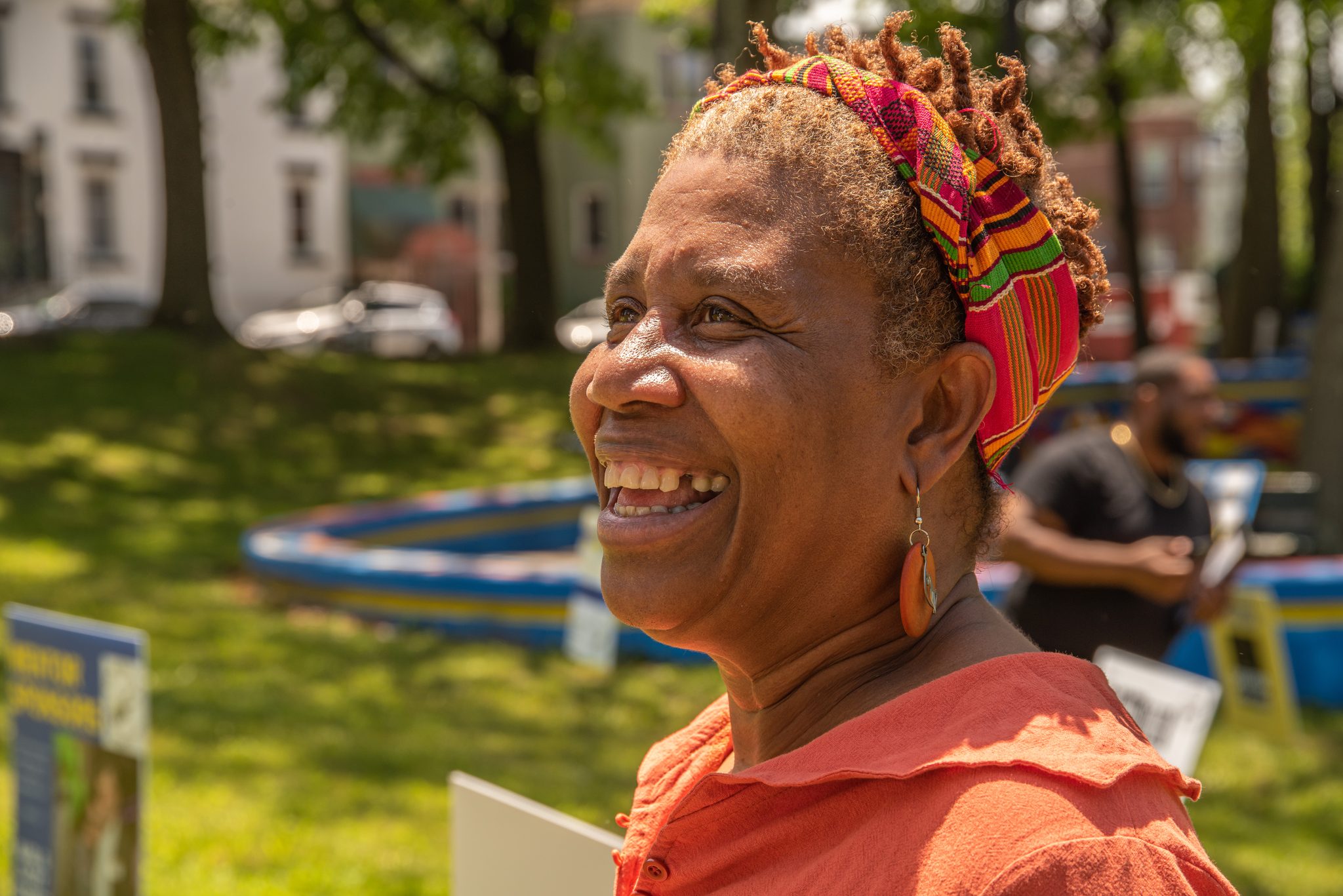Laughter in the sun, a headwrap in every color of the day.