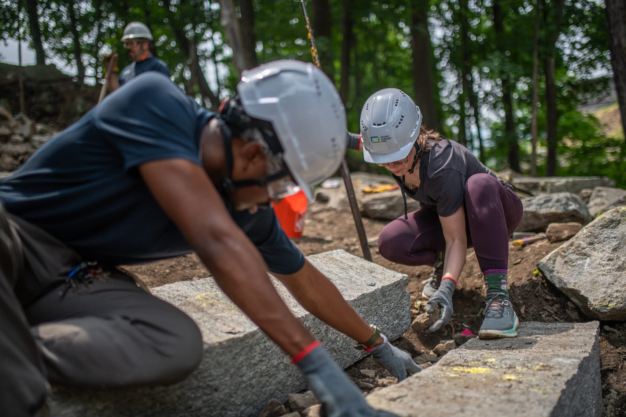 Gloves pressed to the granite, they fine-tune the fit.