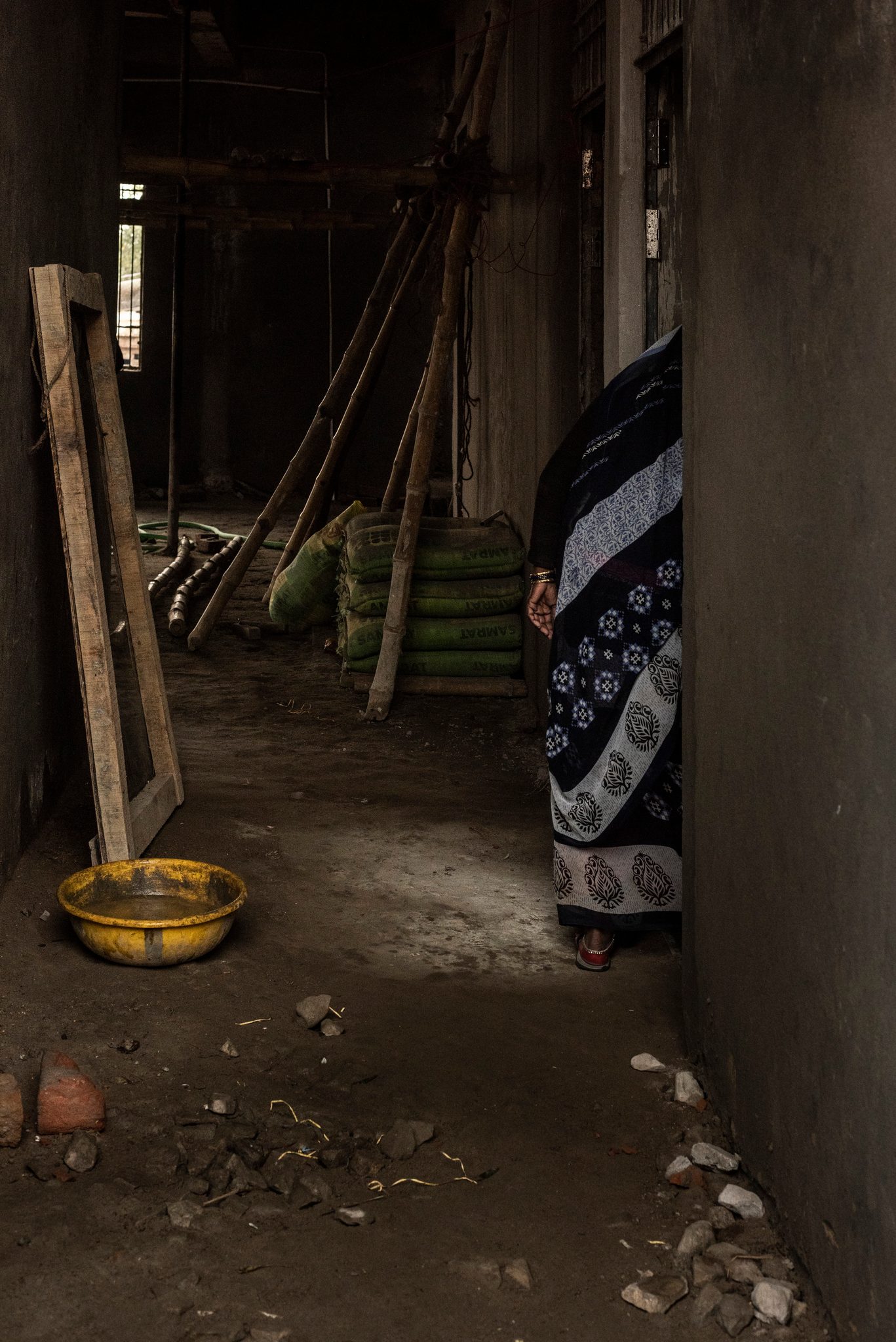Woman dwelling in an abandoned building
