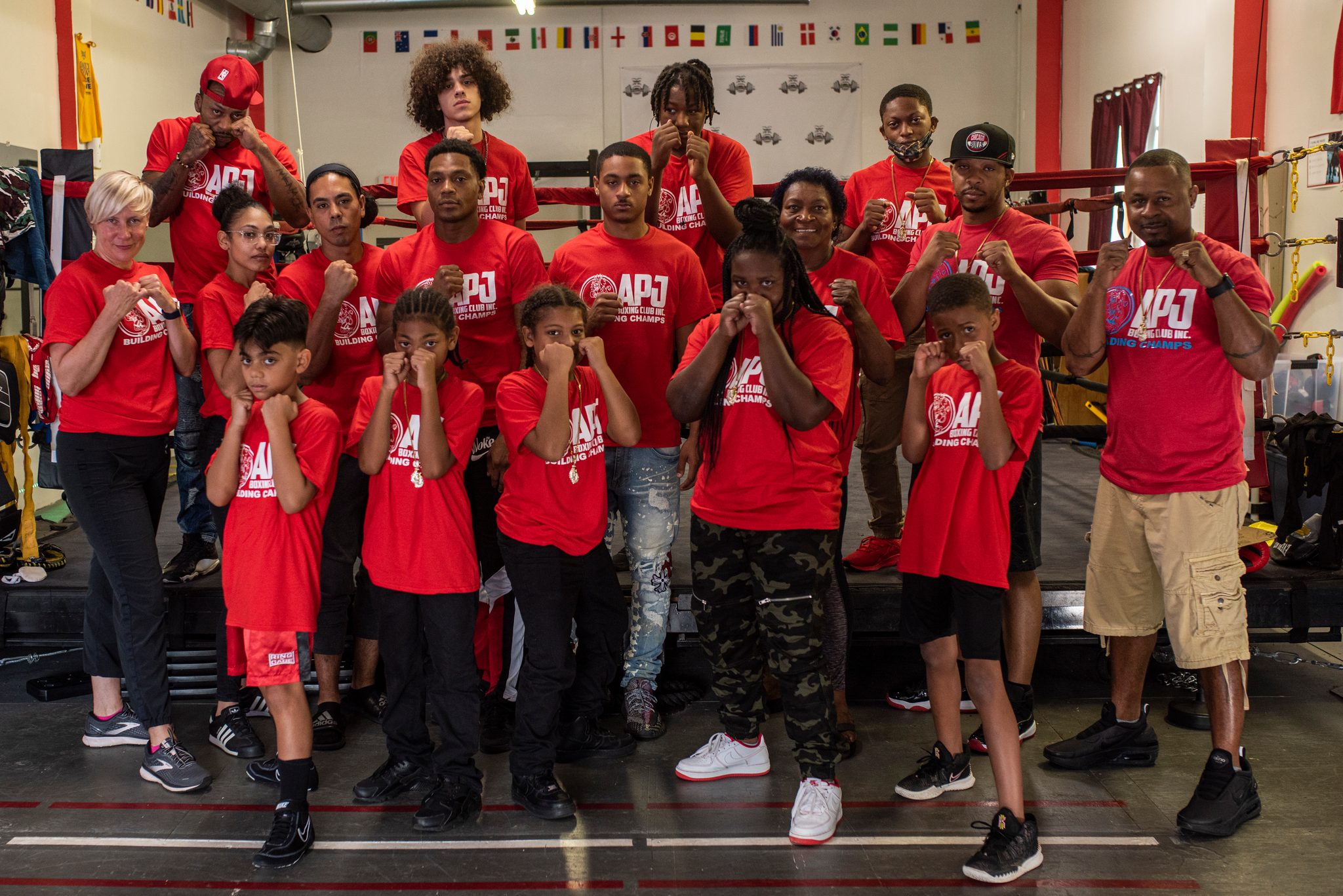 Now with guards up: the club throws its fists up for the camera.