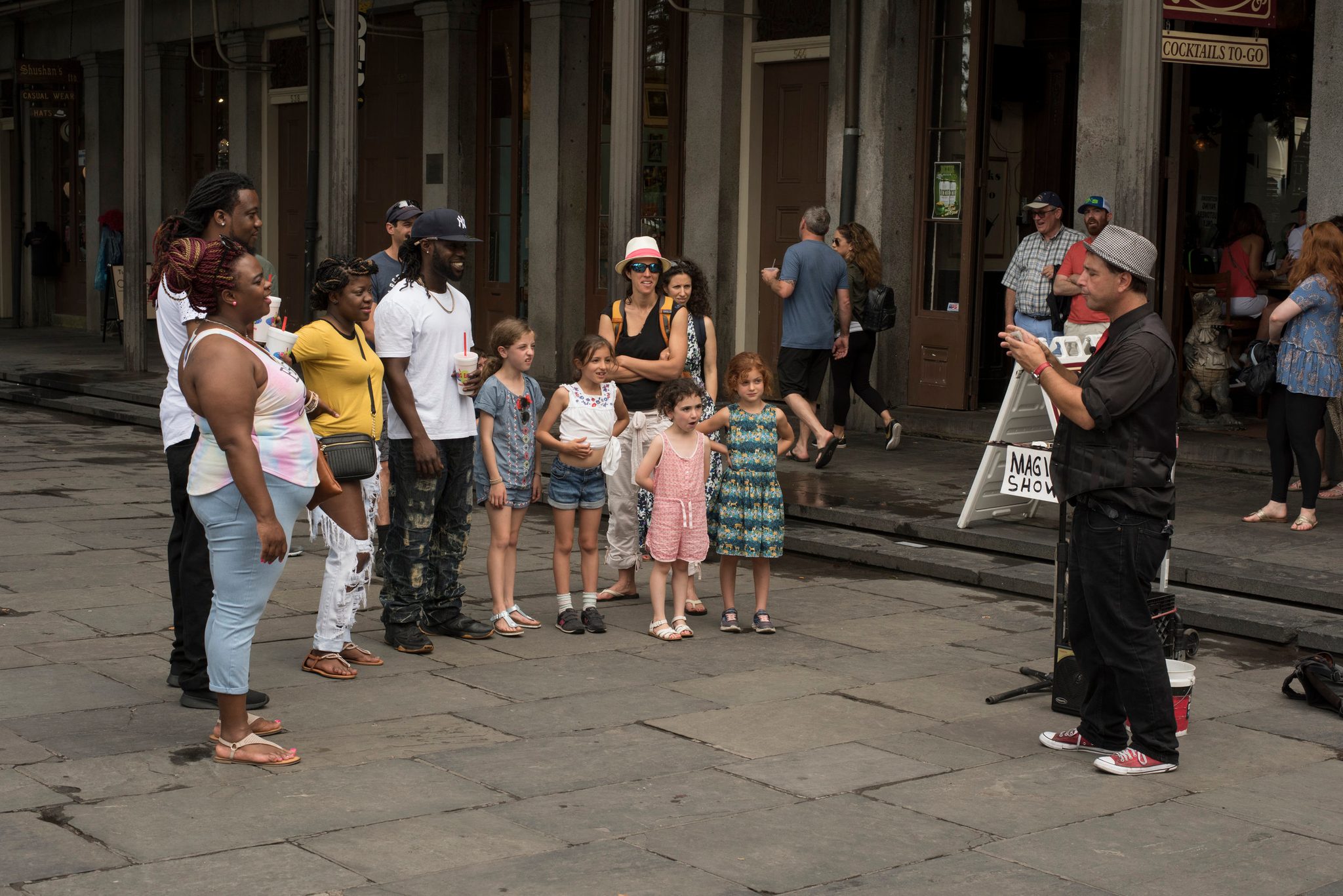 A street magician works the crowd on Jackson Square's flagstones.