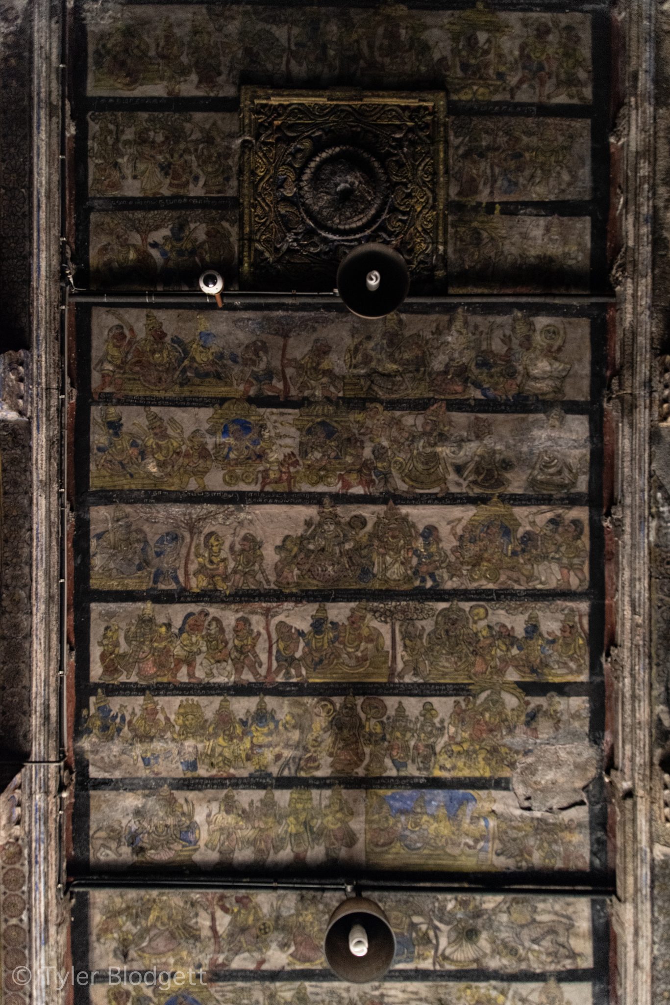 An old carved door studded with worn metal plates.