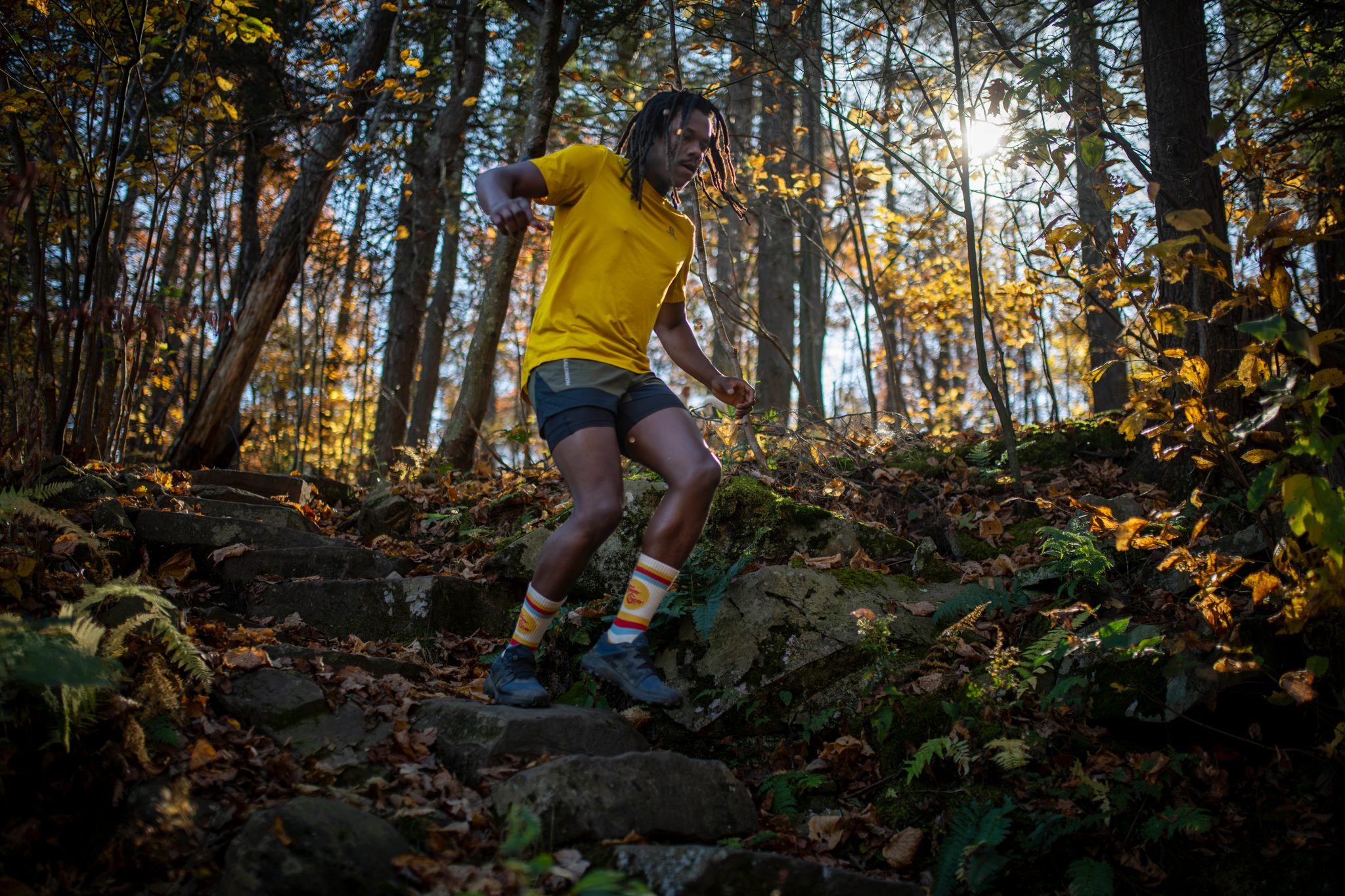 He takes the steps two at a time, arms swinging.