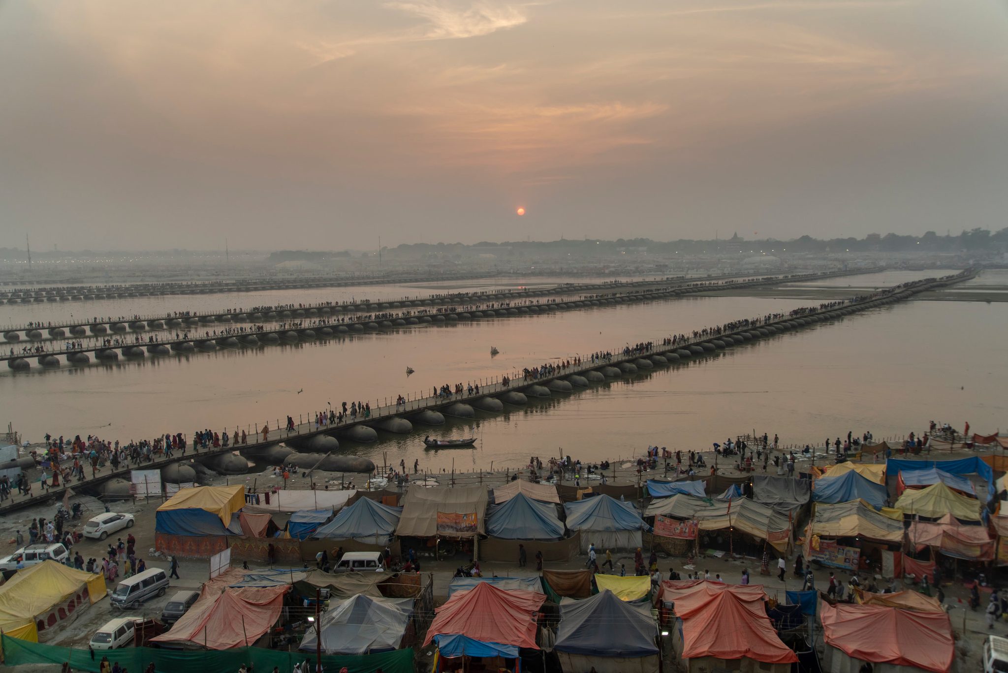 Bridges span from Sangam to the Mela center