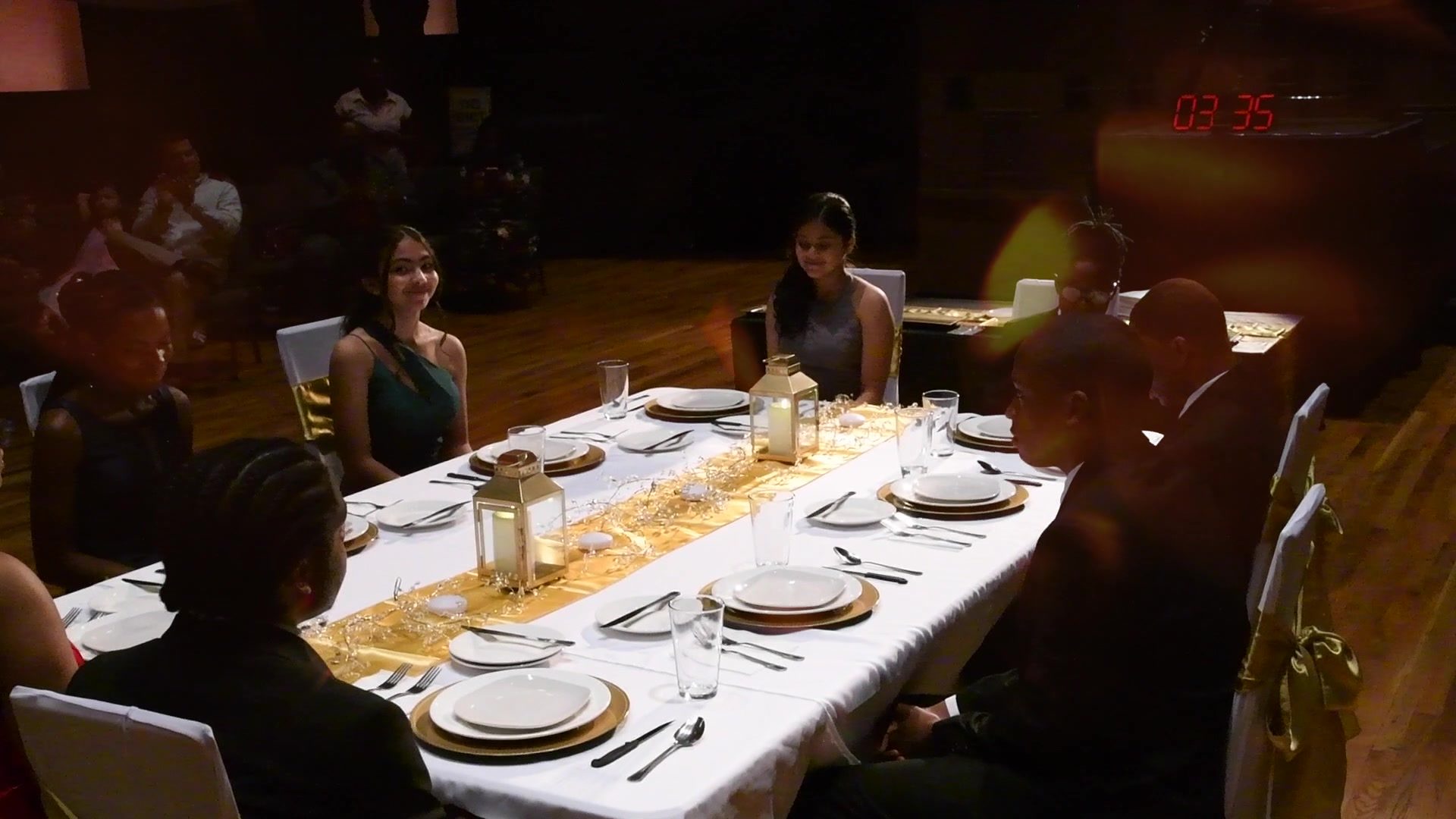 Gold runners and place settings wait for the 2021 graduates at Changepoint Church.