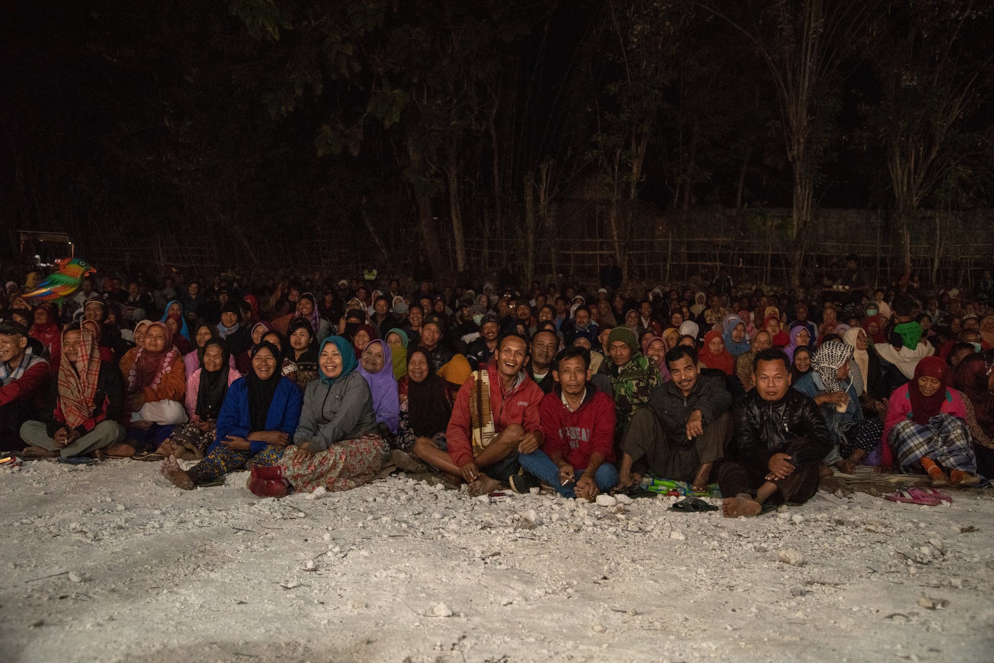Village gathers to watch the Wayang Kulit performance