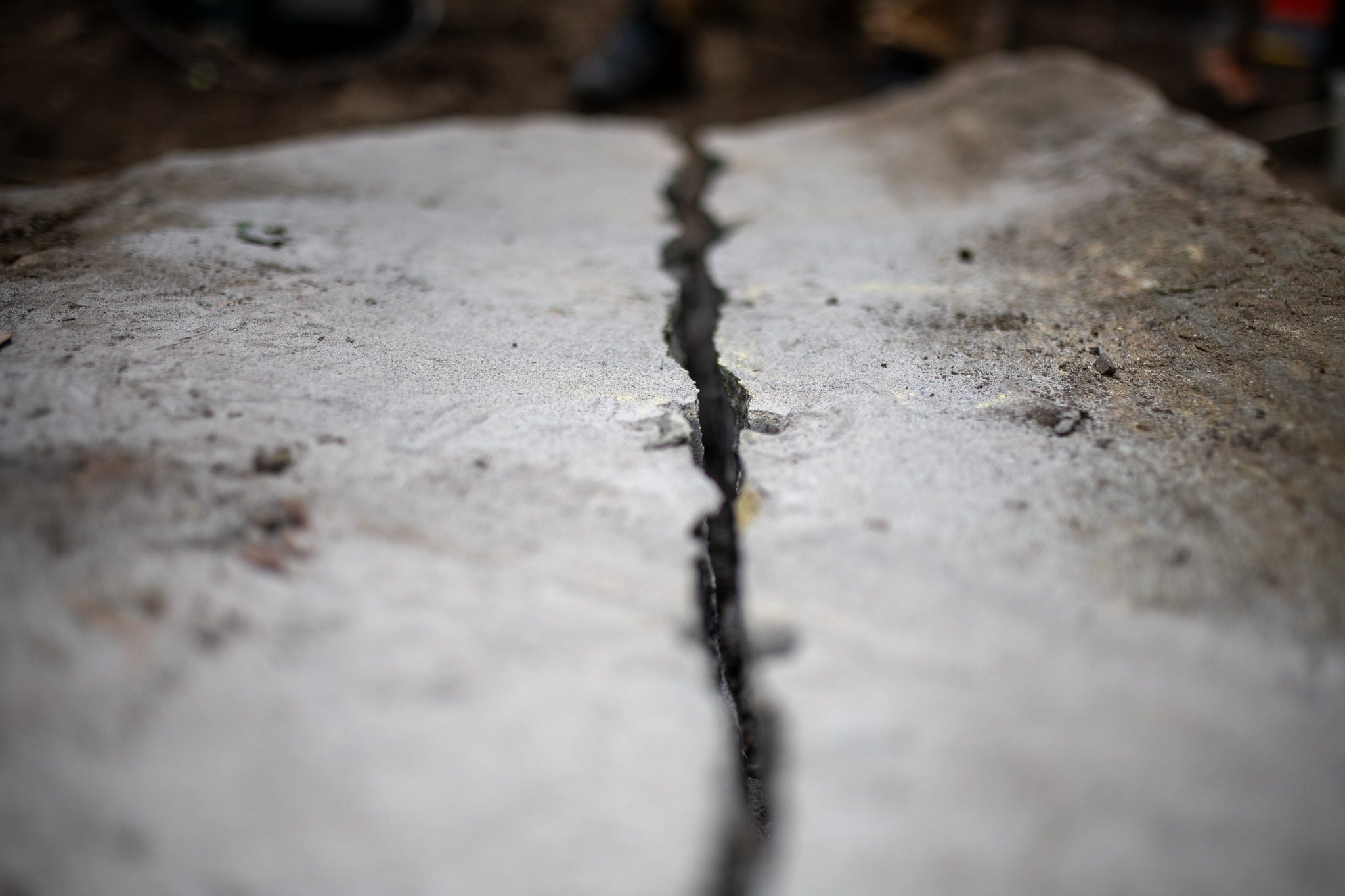 Up close, the fresh break runs straight through the granite.