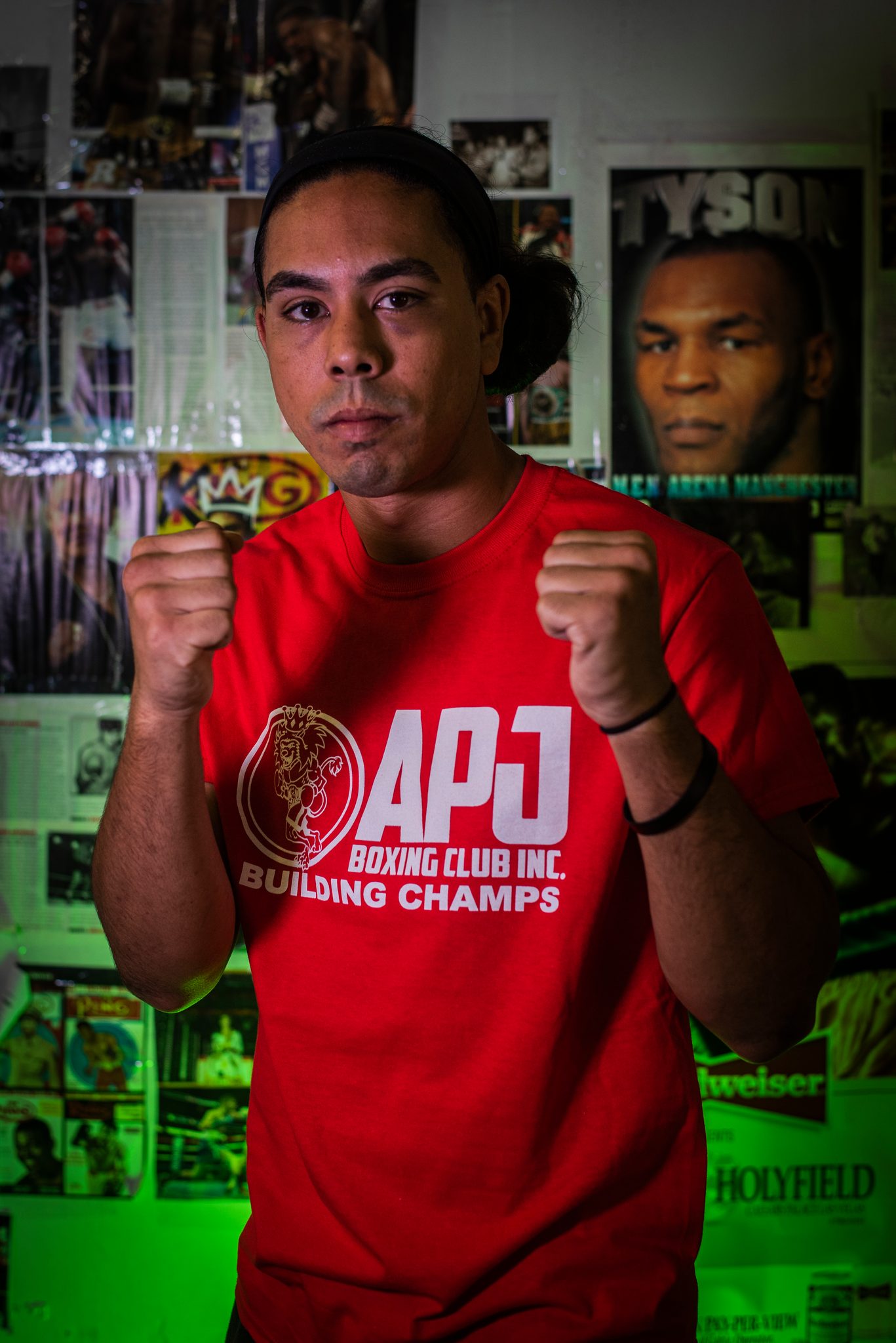 Arms loose, fists ready, a portrait of Tyson over his shoulder.