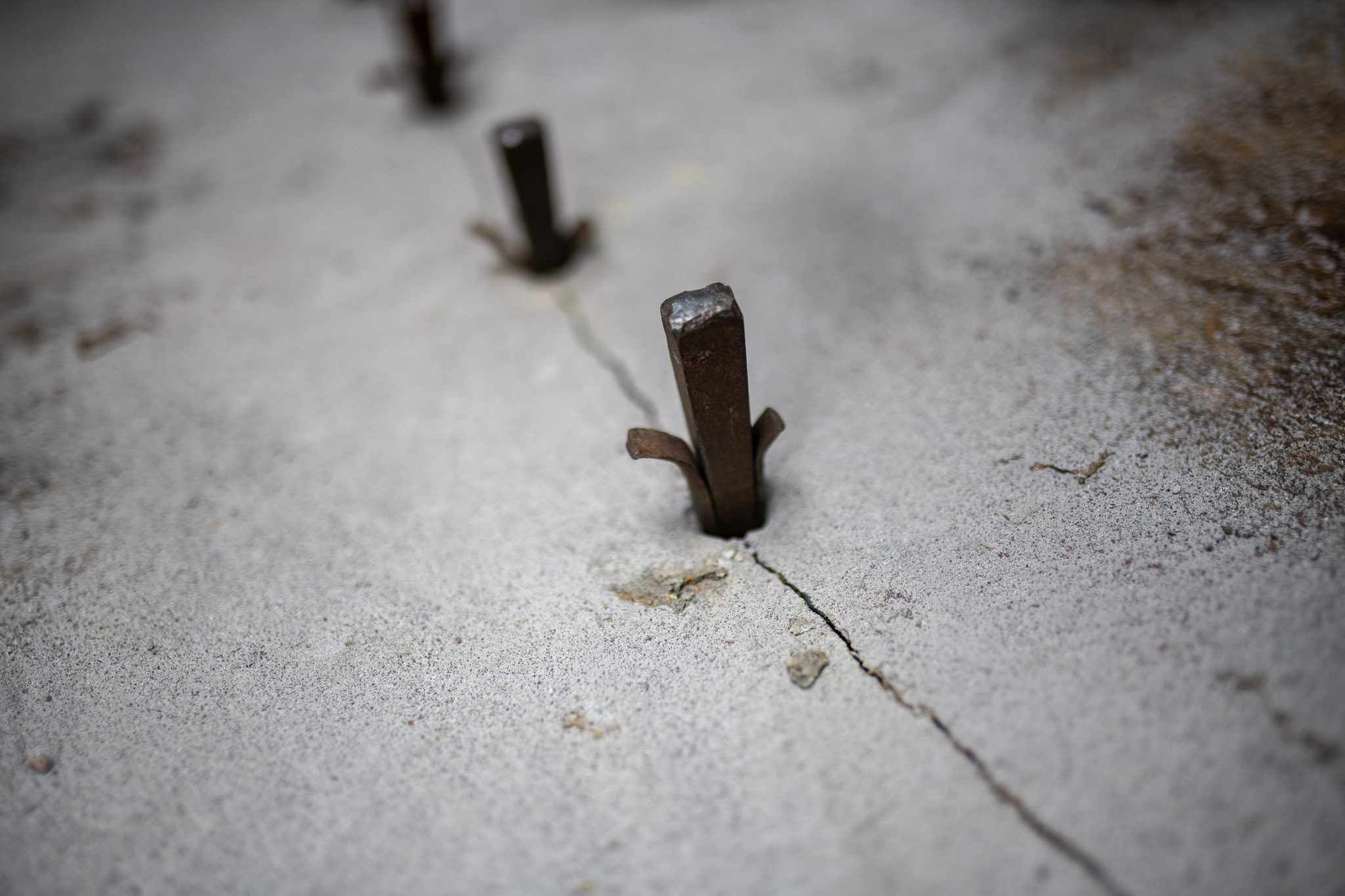 A crack begins to run between the wedges.