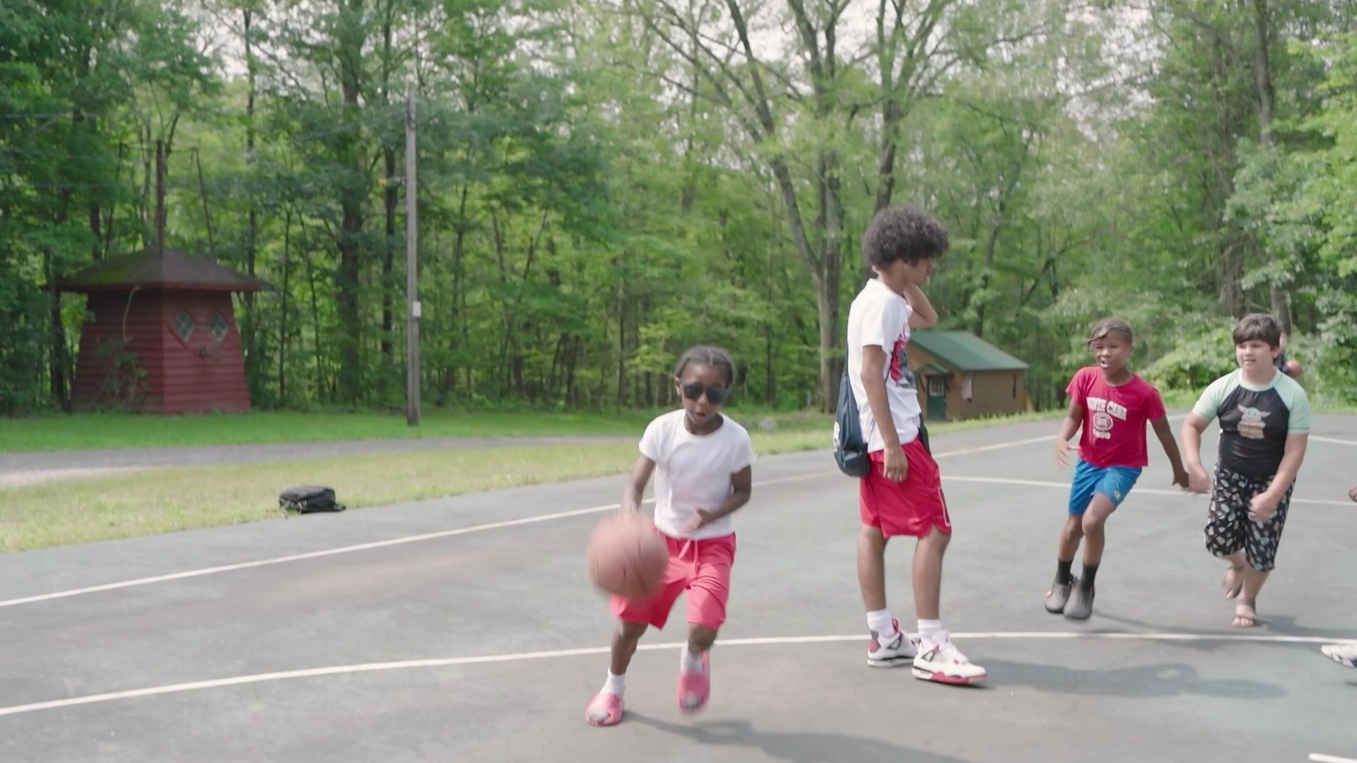 A pickup game on the camp's basketball court.