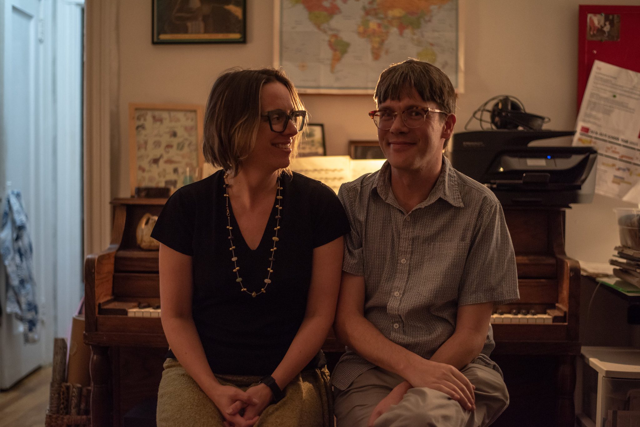 Tom and Molly on the piano bench at home.