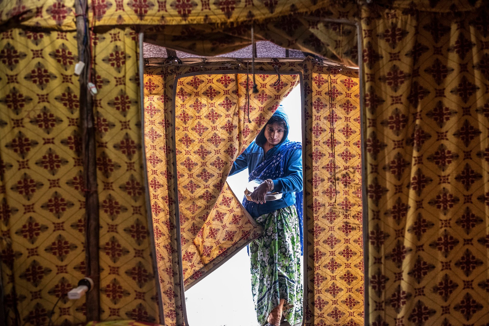 A Kinnar Akada (transgender) enters living quarters