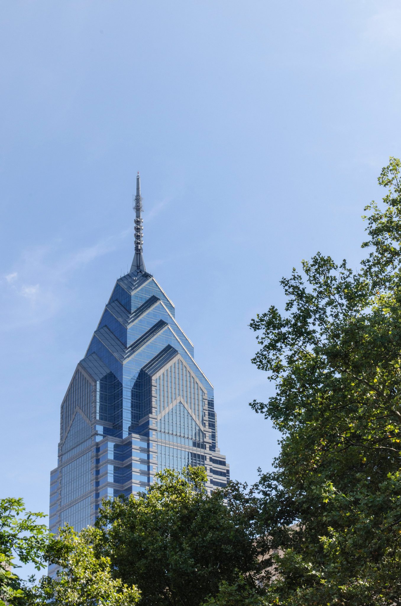 One Liberty Place's spire rises above the trees.