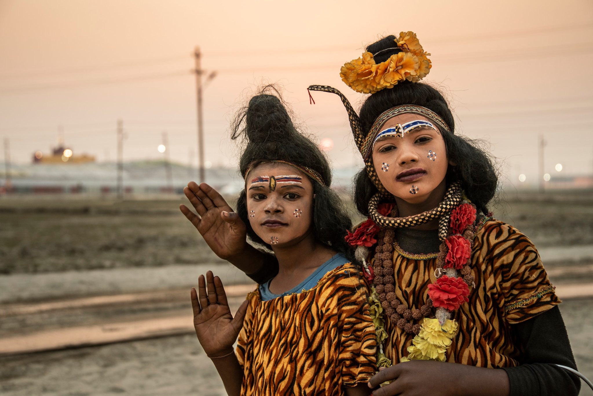 Young boys dress as girls and ask for money