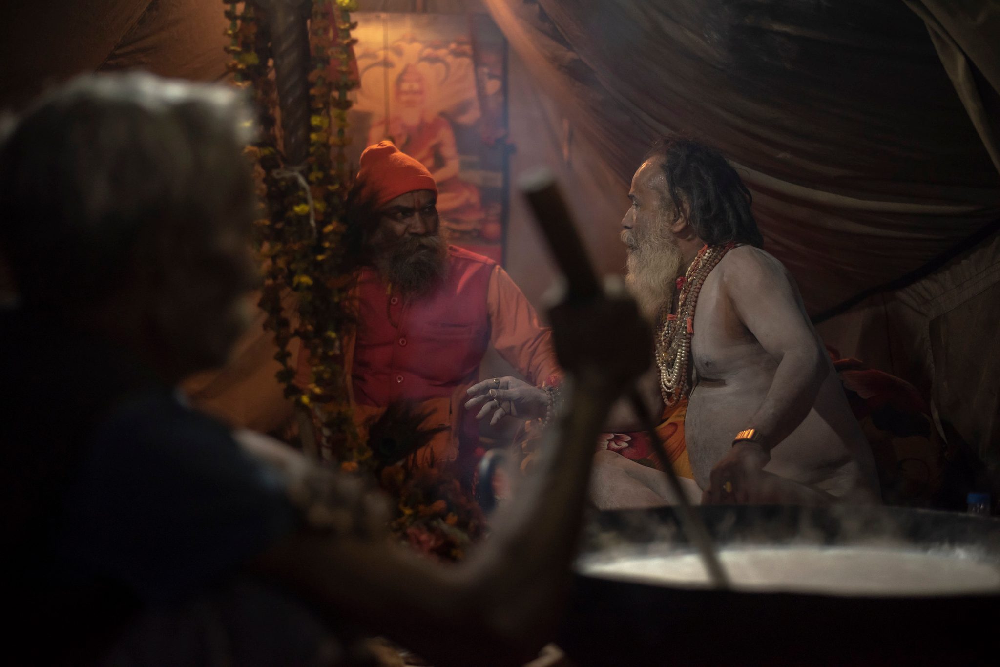 Two sadhu’s (Hindu sages/priests) converse while a man stirs a giant kettle of milk representing the Samudra Manthan, an auspicious ocean of milk from Vedic mythology. This scene, peppered with religious symbolism, was one of countless others within the grand theater of the Mela. Every street, a cast of characters with stories and wisdom to share. But this was far more than pageantry. This was a reflection of the dense and diverse Hindu culture. This was a glimpse into millennia. These were the most