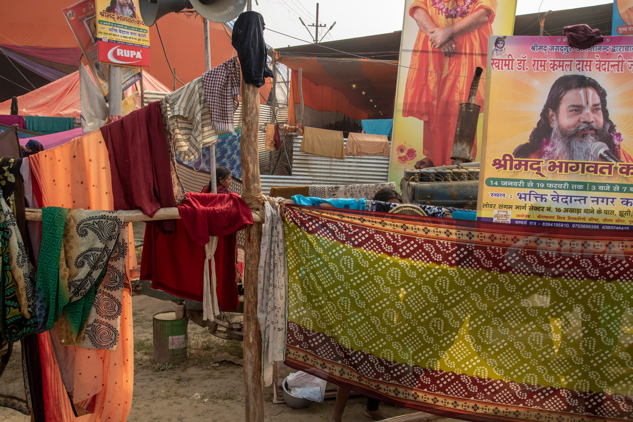 A maze of sarees and clothes dry in the sun