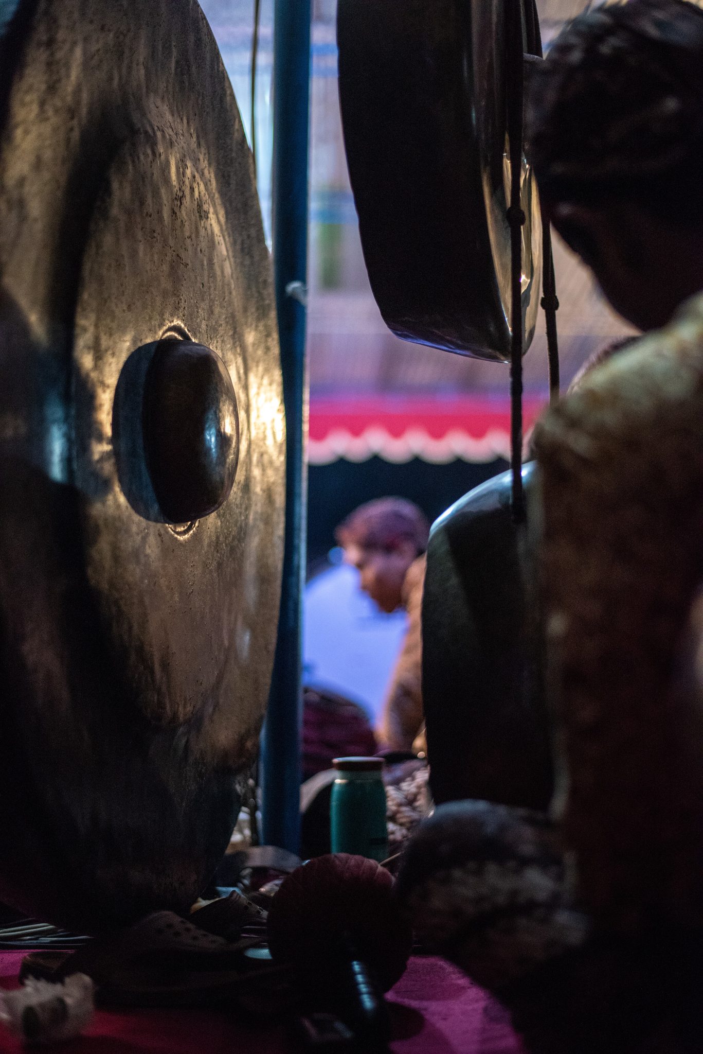 The great gong hangs in the dark, waiting for the one note that belongs to it.